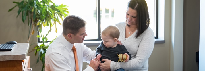 Chiropractor Maplewood MN Nicholas Okins Adjusting Child